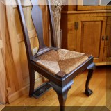 F09. Rush seat chair with claw and ball feet. 